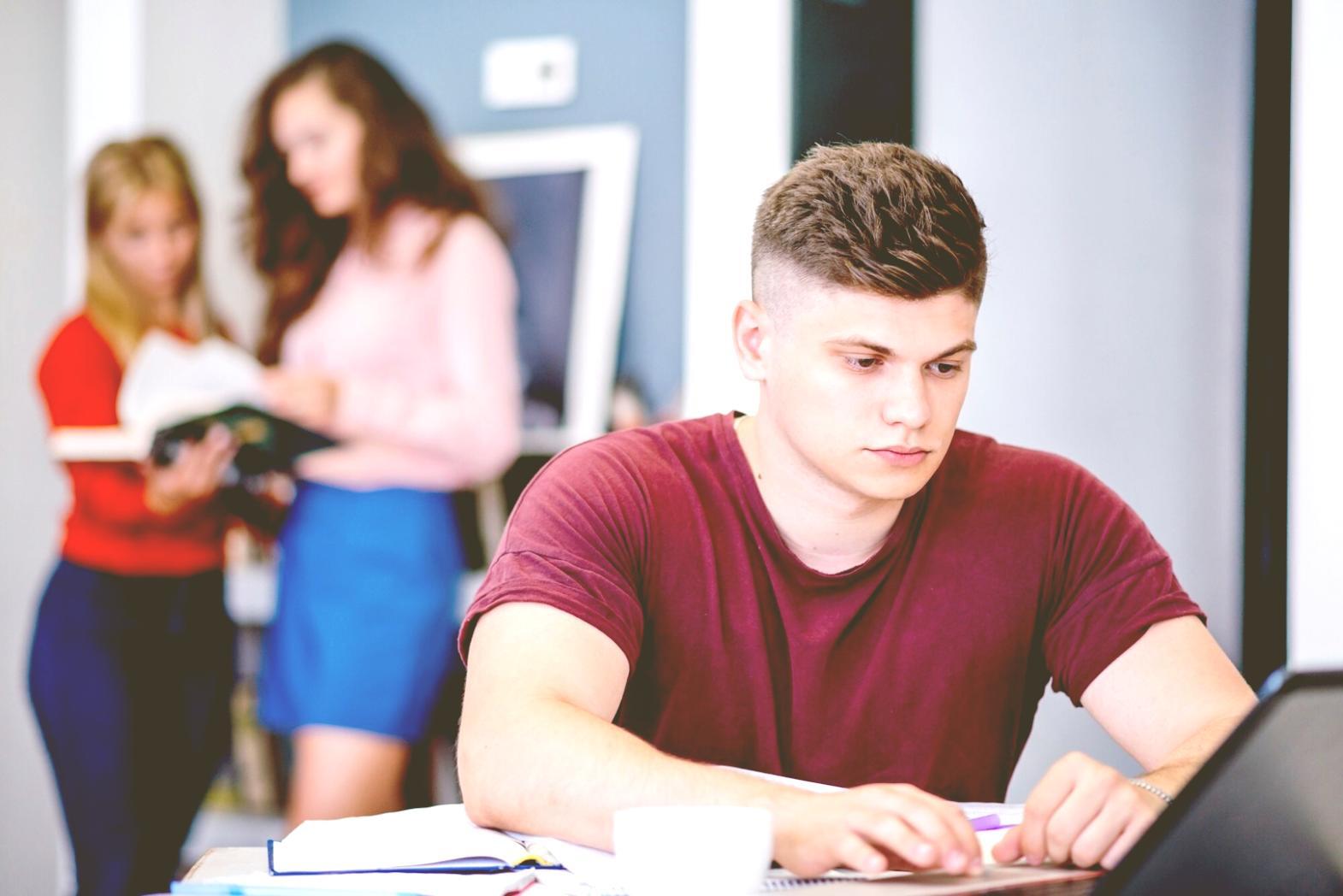 Financial analyst working through complex market data and spreadsheets